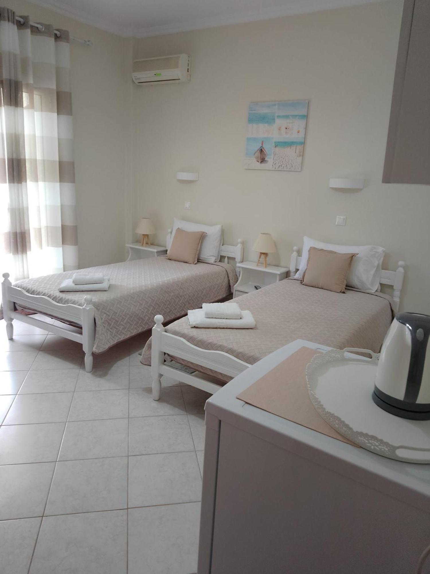 Vicky's Guesthouse Kávos Pokoj fotografie
